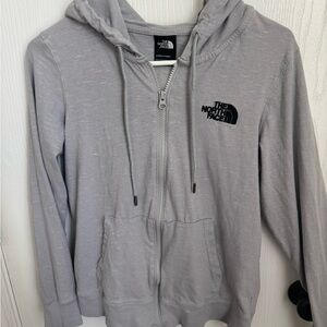 Ladies The North Face Gray Zip-Up Jacket.